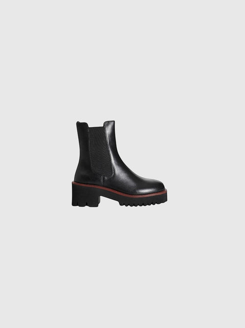 Bottines Chelsea Clueless Paris en cuir noir avec semelle épaisse crantée et empiècements élastiques latéraux